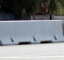 Concrete Jersey Barrier Wall in Grey Color