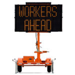 A Workers Ahead Sign on a Display Unit